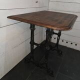 Bistro table with cast iron legs and oak top