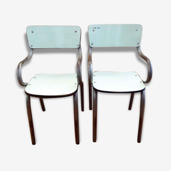 2 chairs of school children