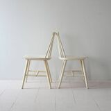 Paire de chaises blanches vintage
