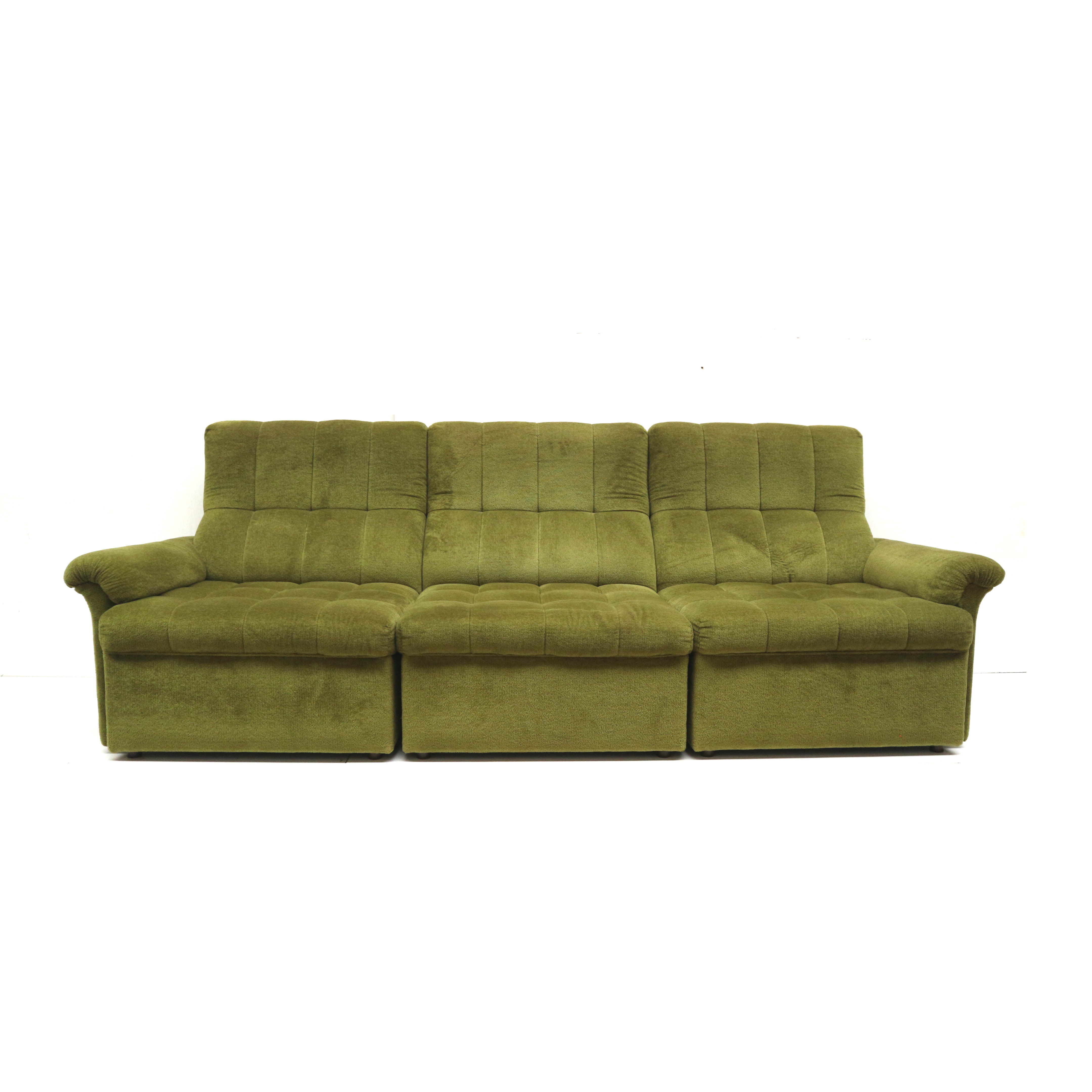 Green velvet vintage element sofa made in the 1970s