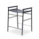 Contemporary artisan bar stool in navy blue leather and black rubber metal.