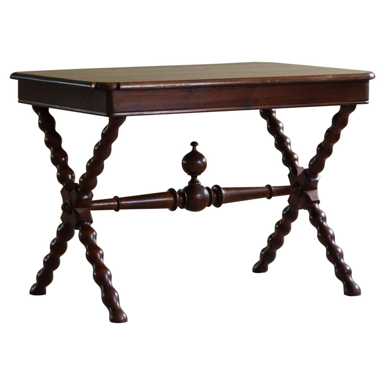 French sculptural desk in stained pine, early 20th century, Baroque style.