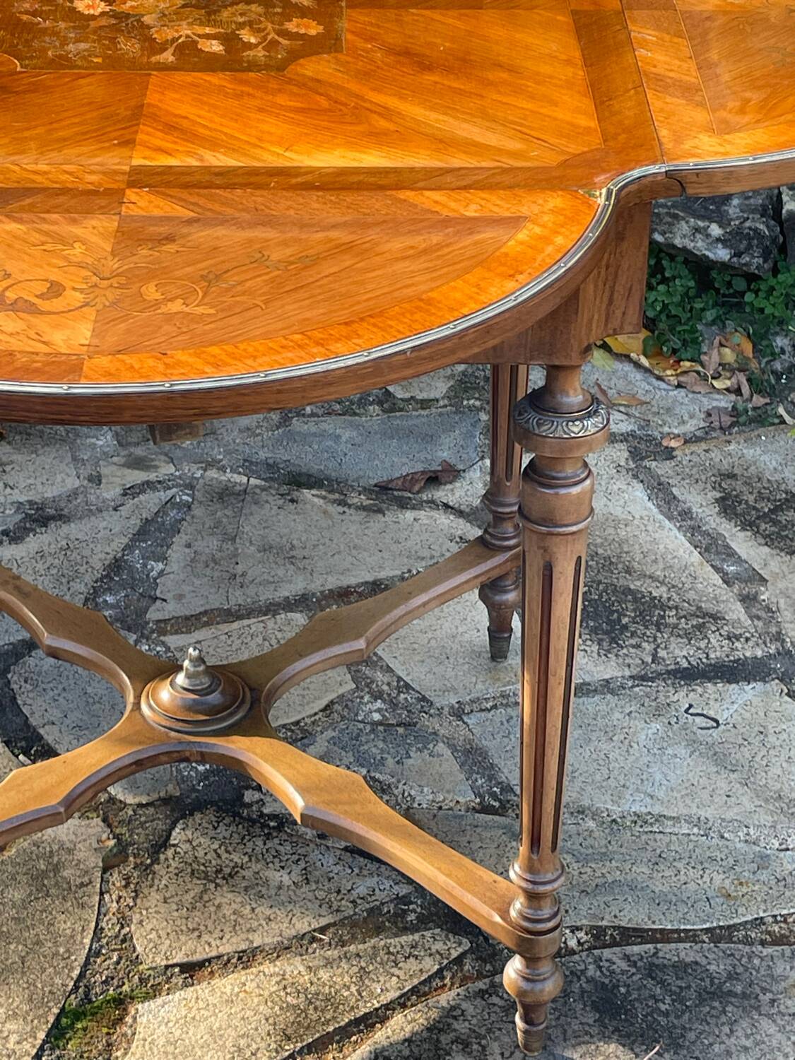 Center table decorated with marquetry of leaves and flowers in Louis XVI style, 19th century period
