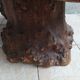 Brutalist chessboard coffee table made from tree stump.