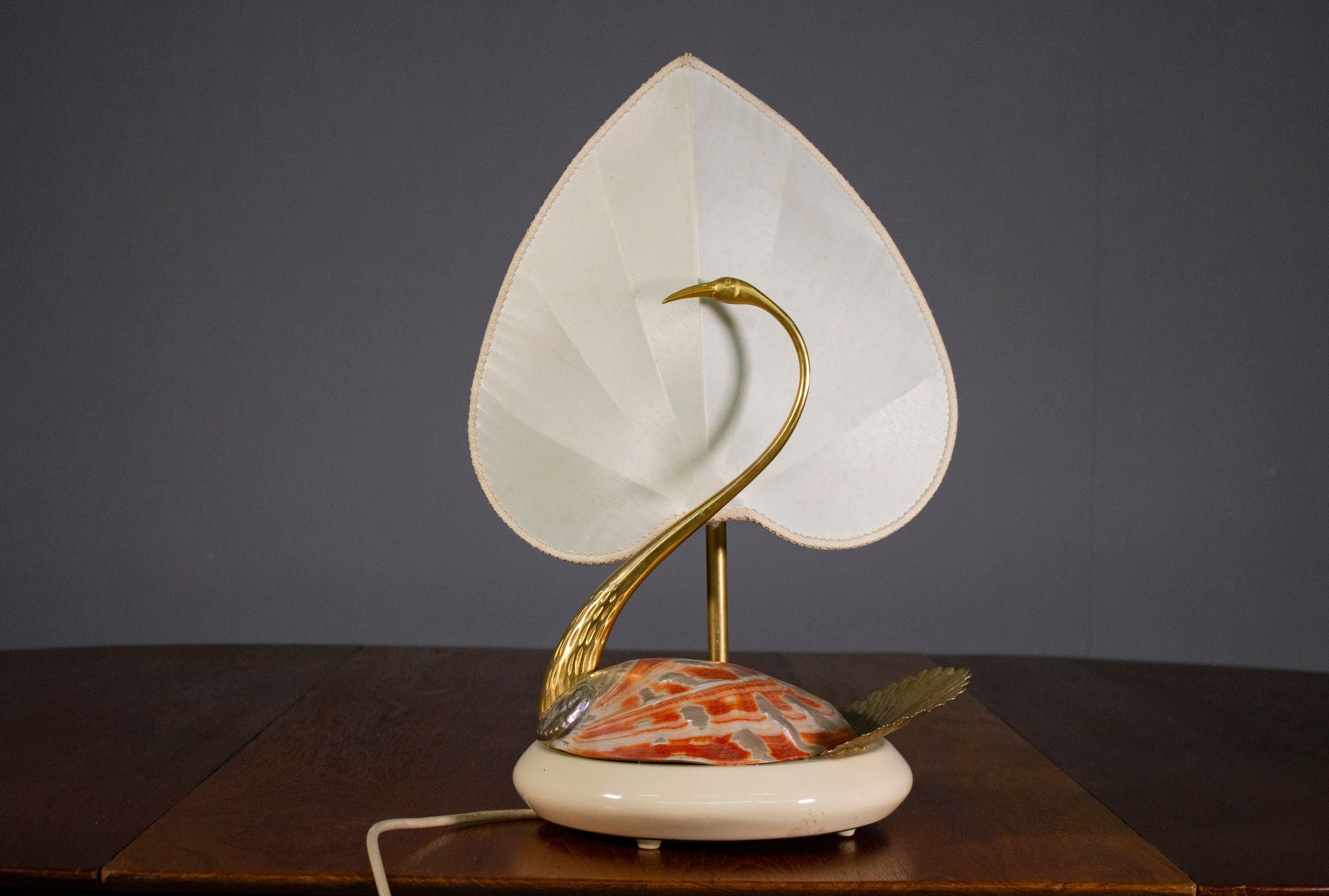 Table lamp, Cigno, made of steel and Nautilus shells, by Antonio Pavi