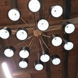 Black chandelier and gilded metal