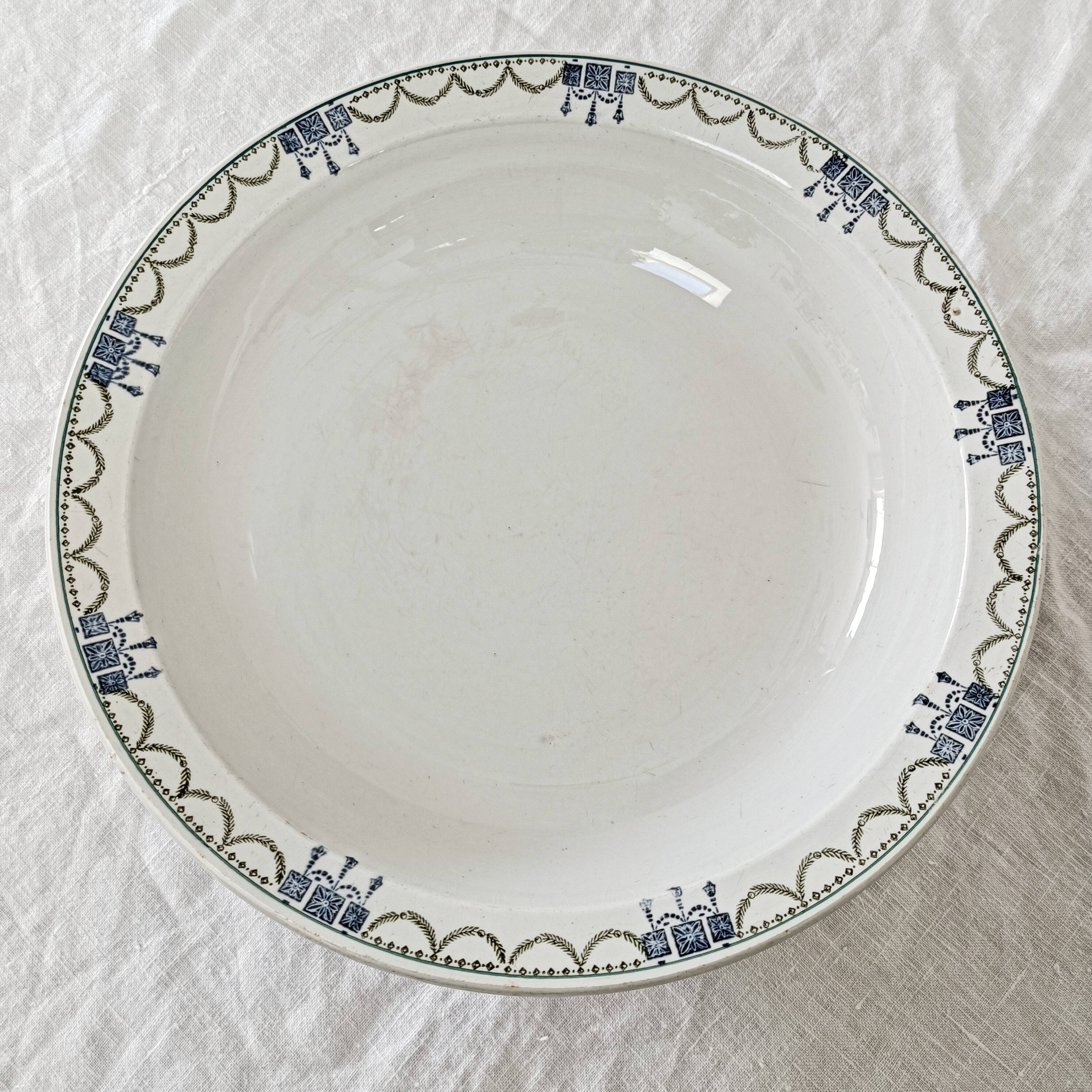 Large hollow dish iron earth Company Amandinoise