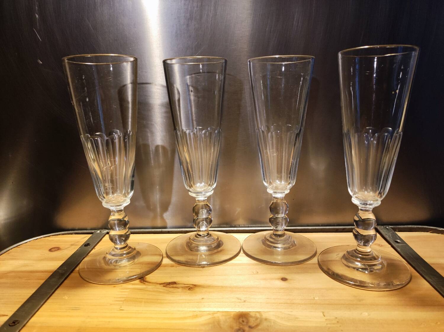 4 champagne flutes with cut sides, late 19th century