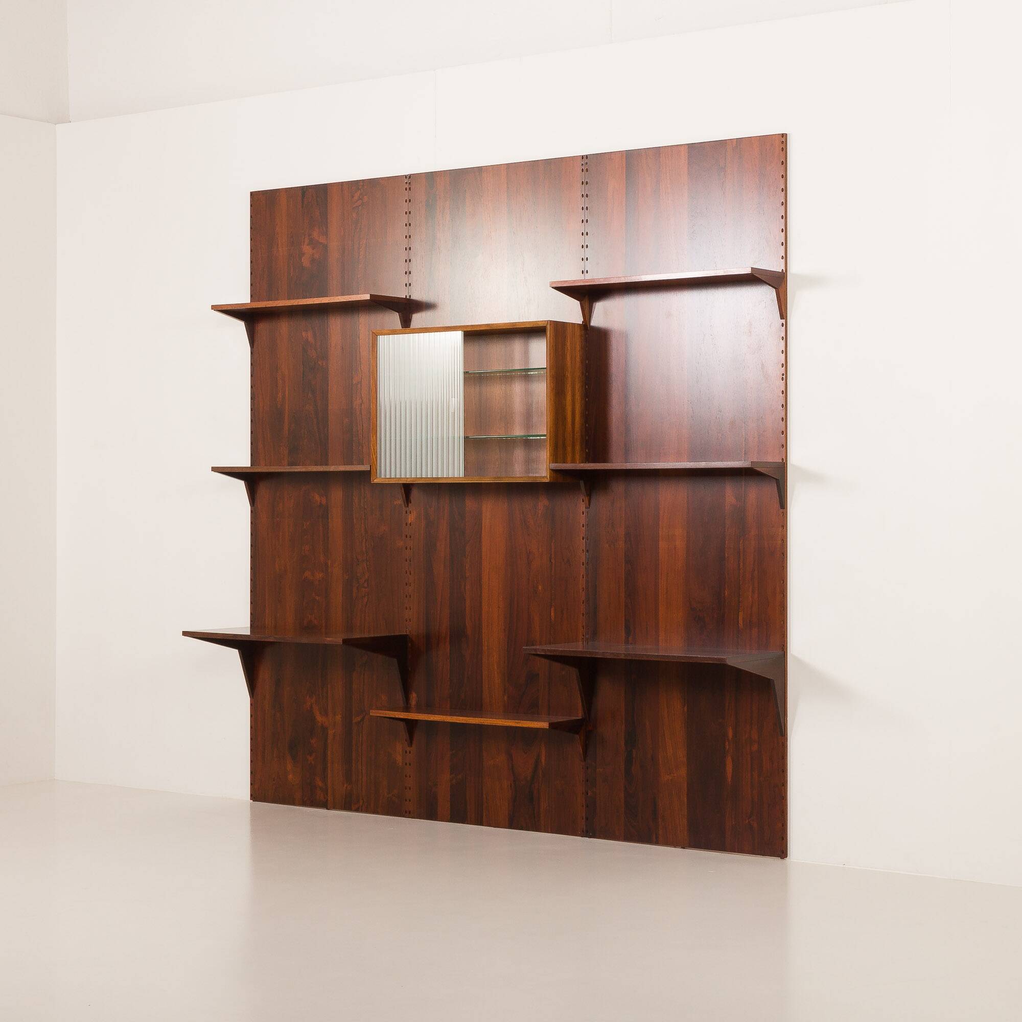 Poul Cadovius rosewood wall unit on panels for Cado, Denmark 1960s
