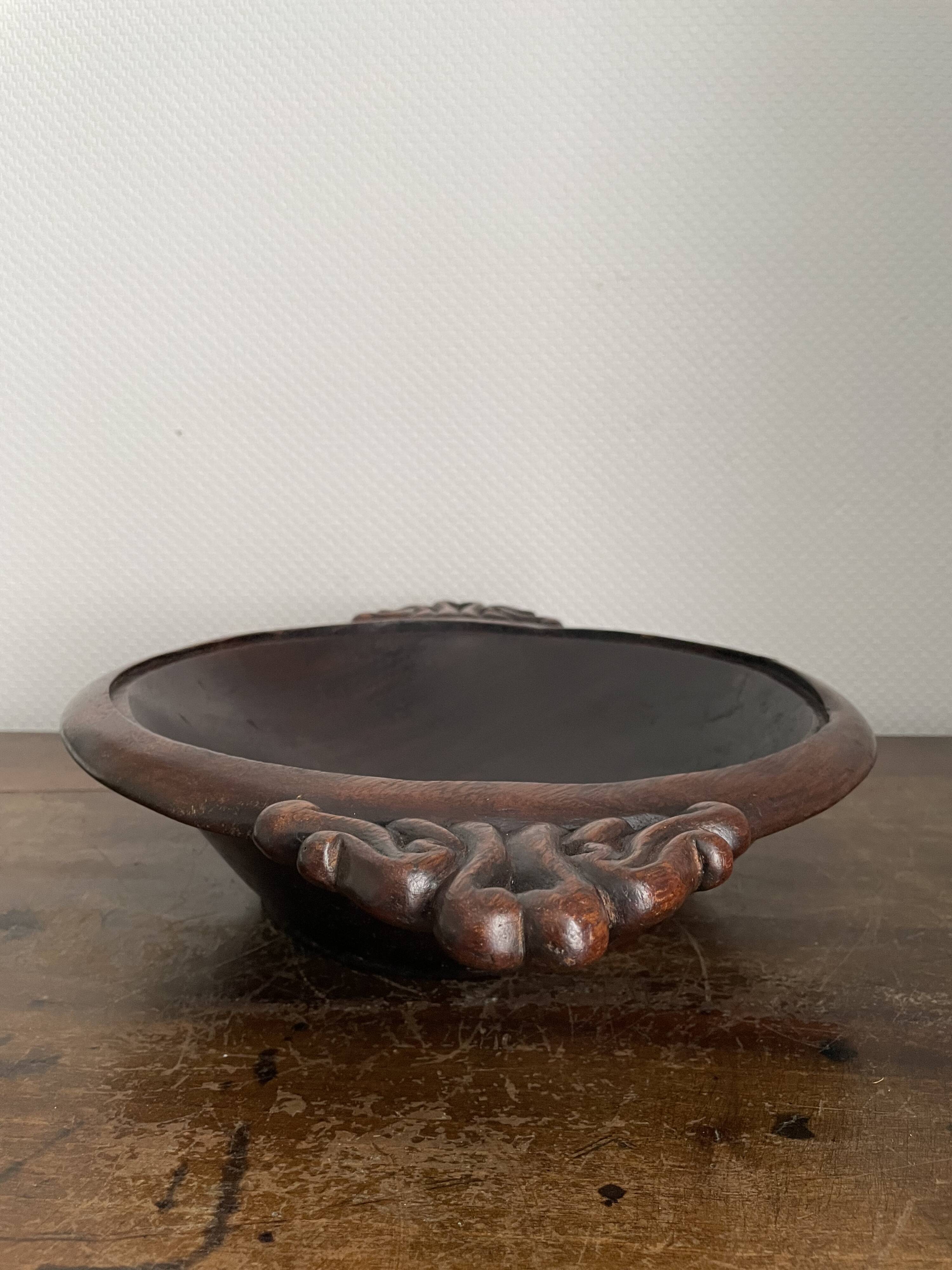 Hollow carved wooden dish
