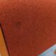 Fauteuil chauffeuse Fröscher vintage en tissu orange et bois des années 70 80
