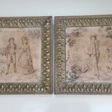 Antique tapestries framed in repoussé brass.