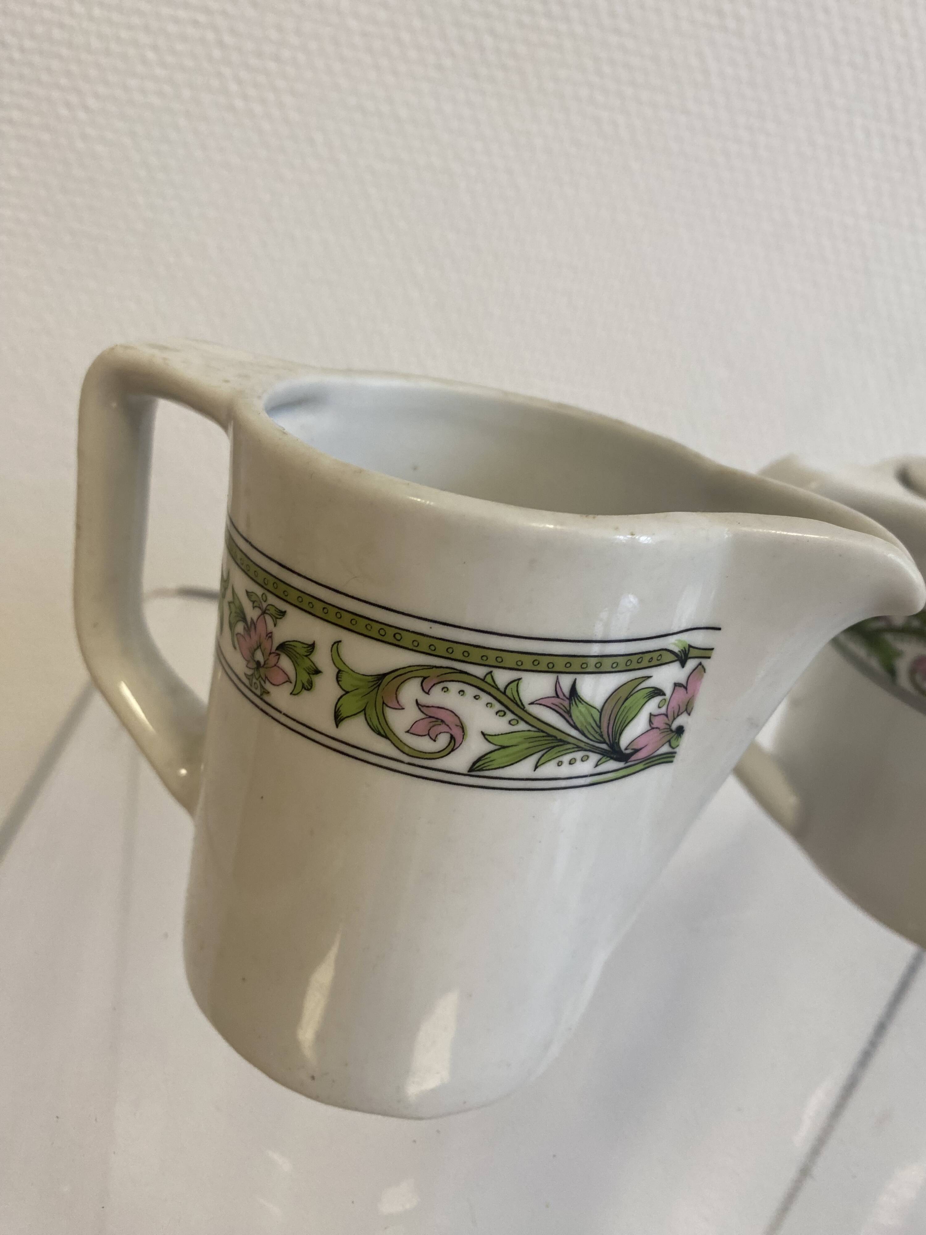 Teapot and milk jug set