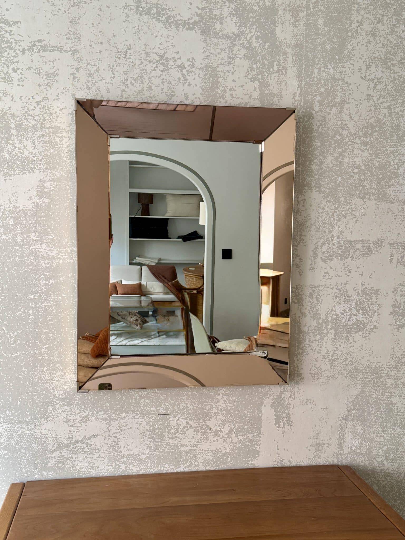 Faceted mirror with rose-coloured frame – Italy, 1980s