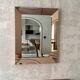 Faceted mirror with rose-coloured frame – Italy, 1980s