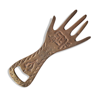 Brass hand bottle opener, 60s