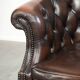 Brown cow leather Chesterfield office chair on wheels in English style