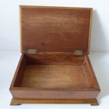 Branded wooden box decorated with suns