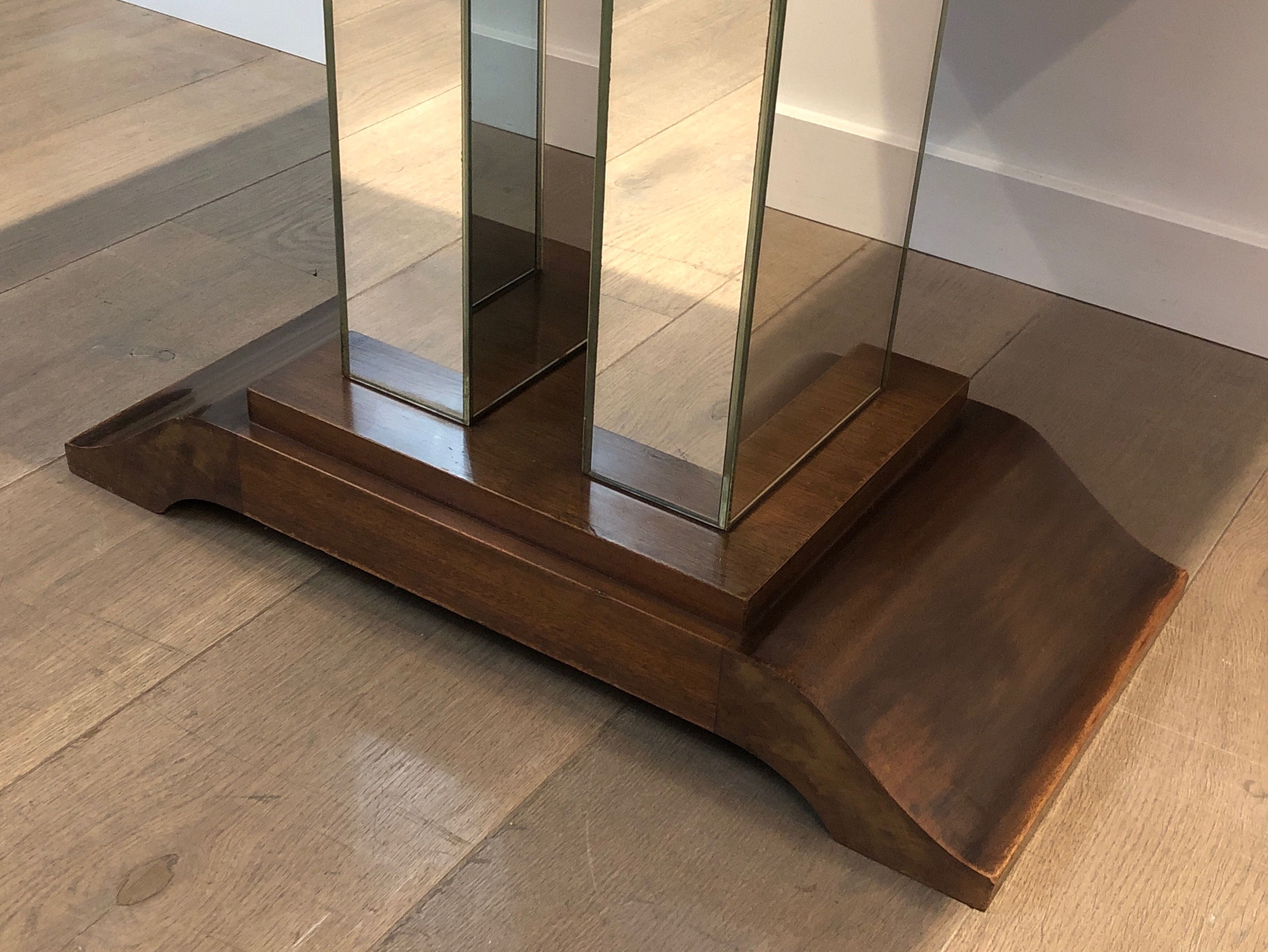 Art Deco centre table with a mirrored eglomisé top in the style of Jules Leleu and Max Ingrand.