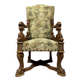 Renaissance ceremonial throne chair with slightly curved back in carved walnut