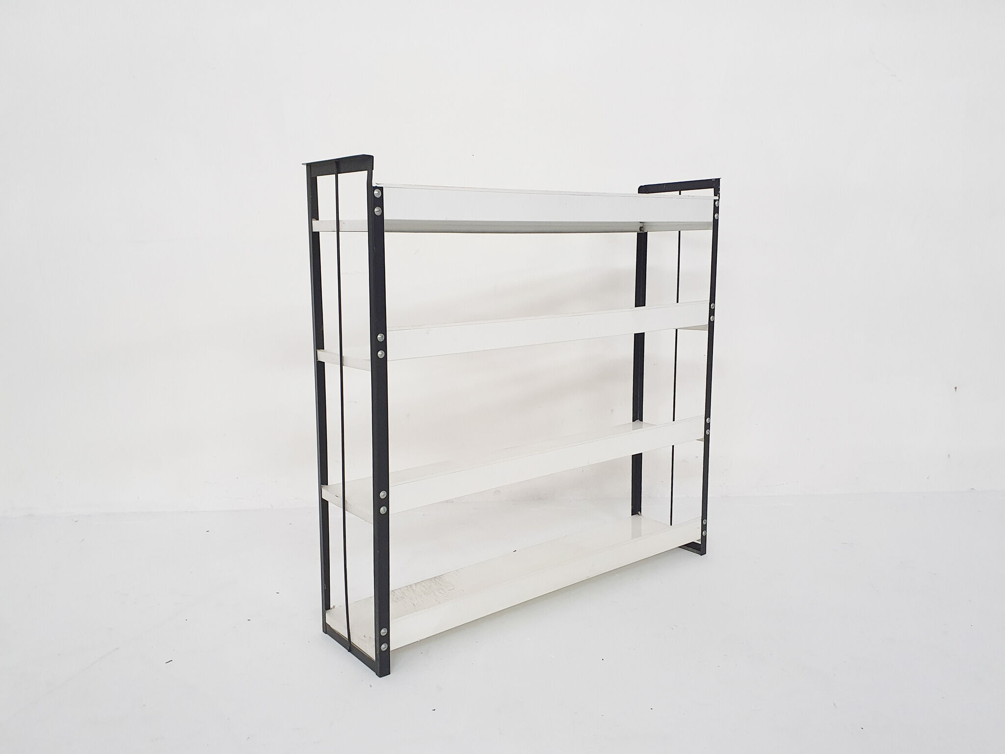 Black and white metal book shelves attrb. to Tomado, Holland, 1950's