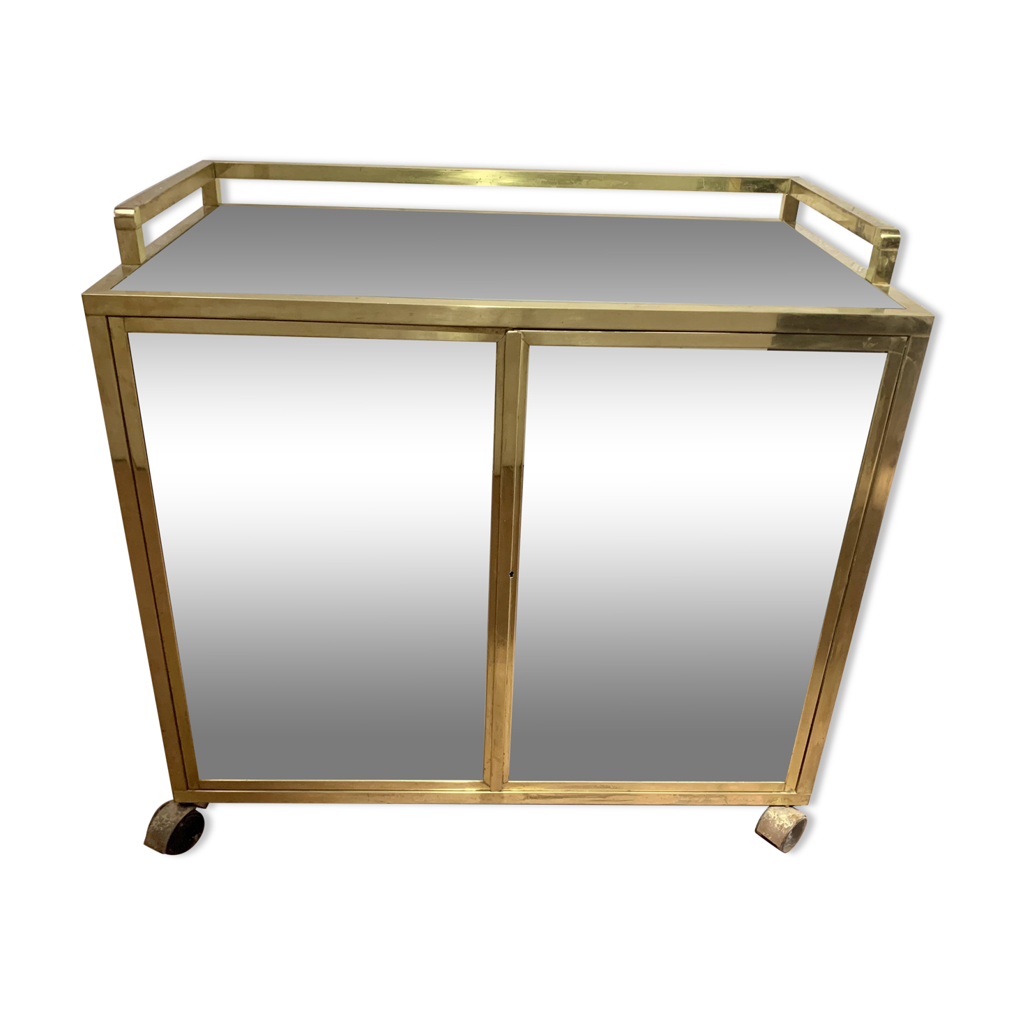 1970s brass bar with a mirrored front from the 20th century.