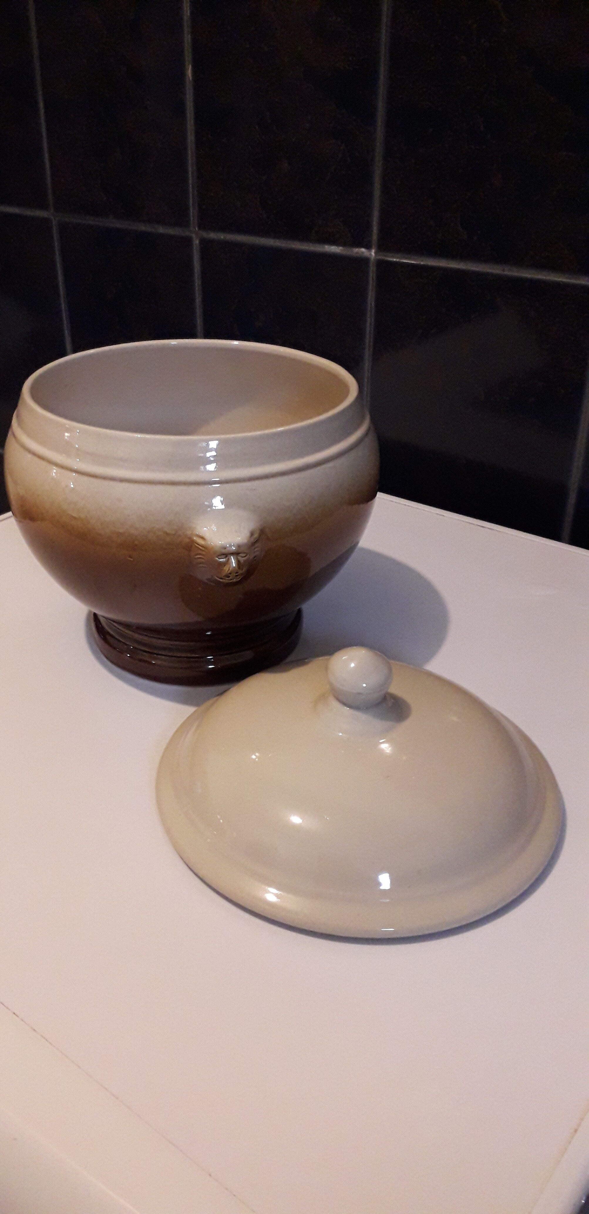 Large covered two-tone ceramic soup bowl with "lion's head" handles