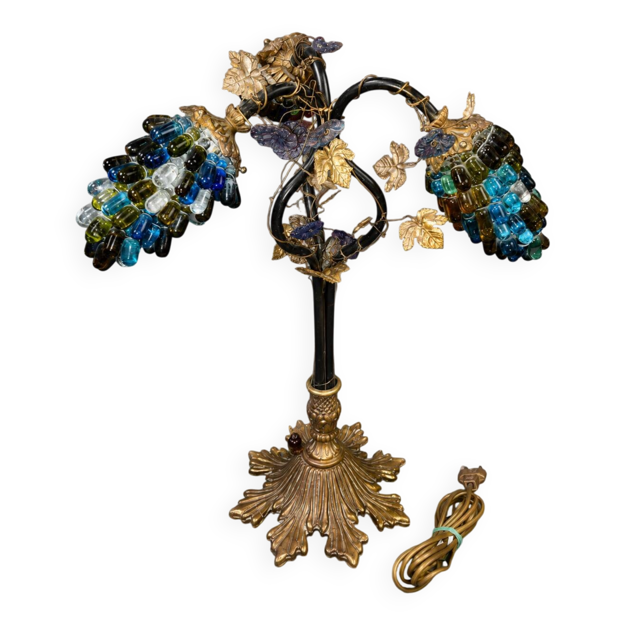 Decorative table lamp in the shape of coloured glass grape clusters.