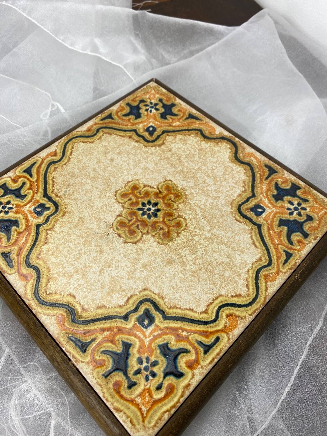 Ceramic and wood trivet