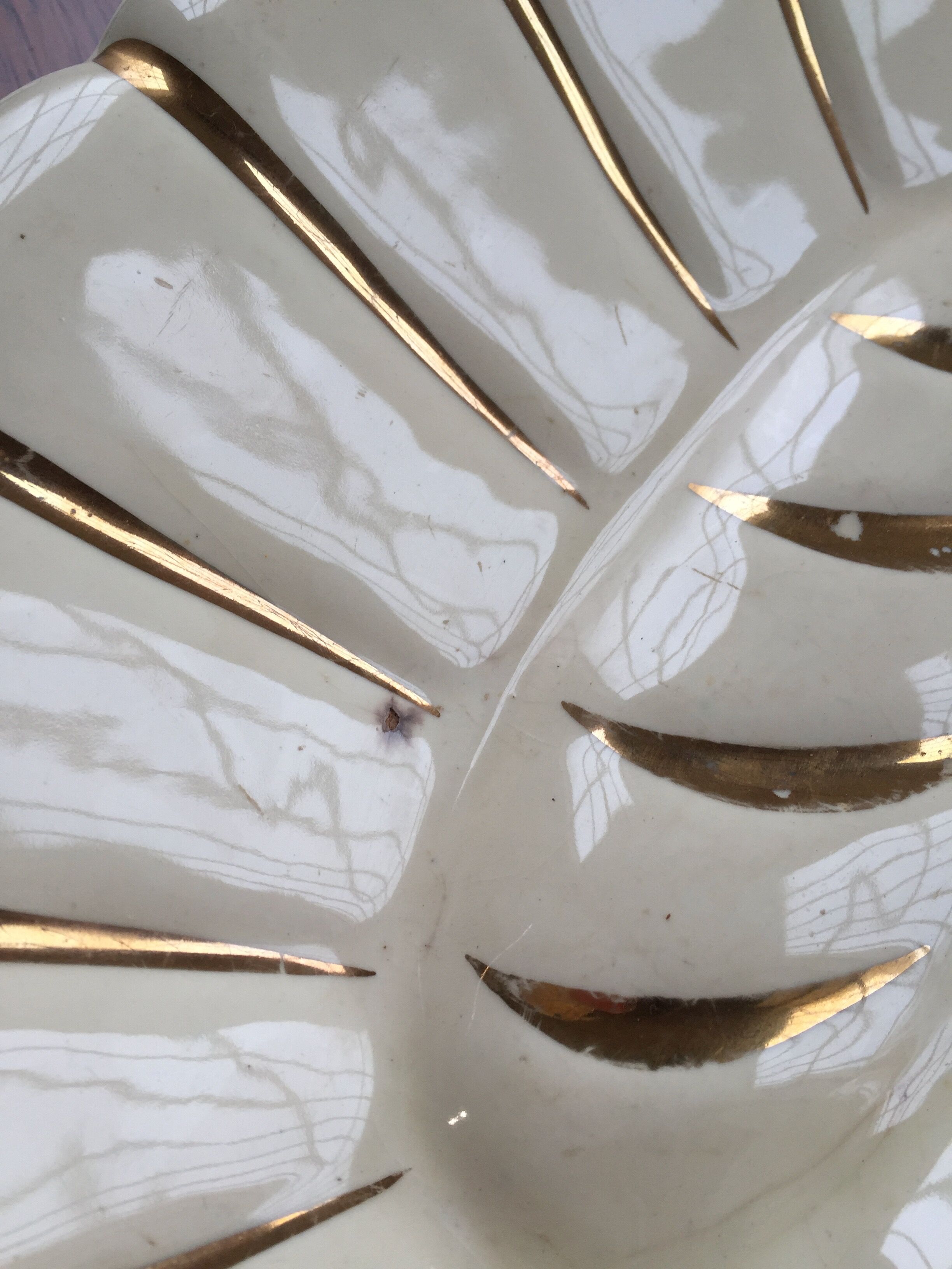 White and gold ceramic plate