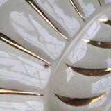 White and gold ceramic plate