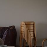 Modern Swedish, set of 14 stackable stools in birch and hessian fabric, 1980s.