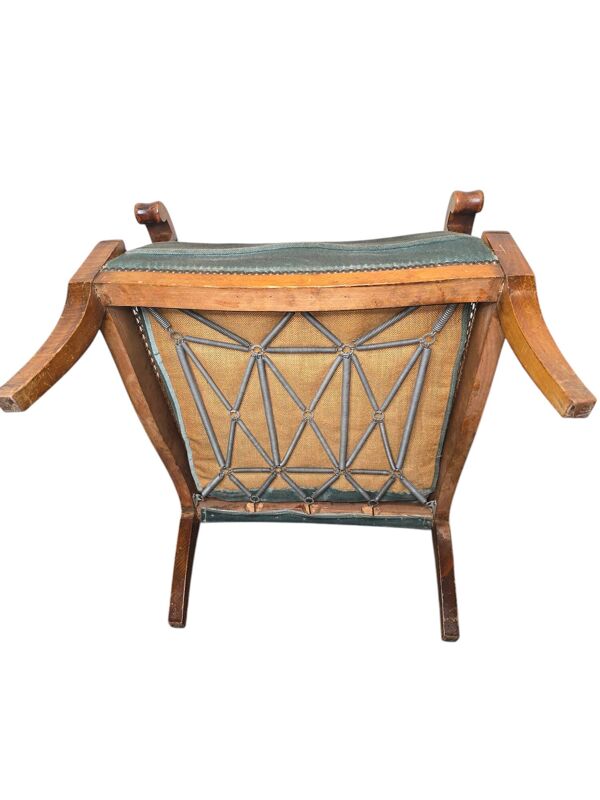 Fauteuil bergère style Régence en bois, tissu et cannage