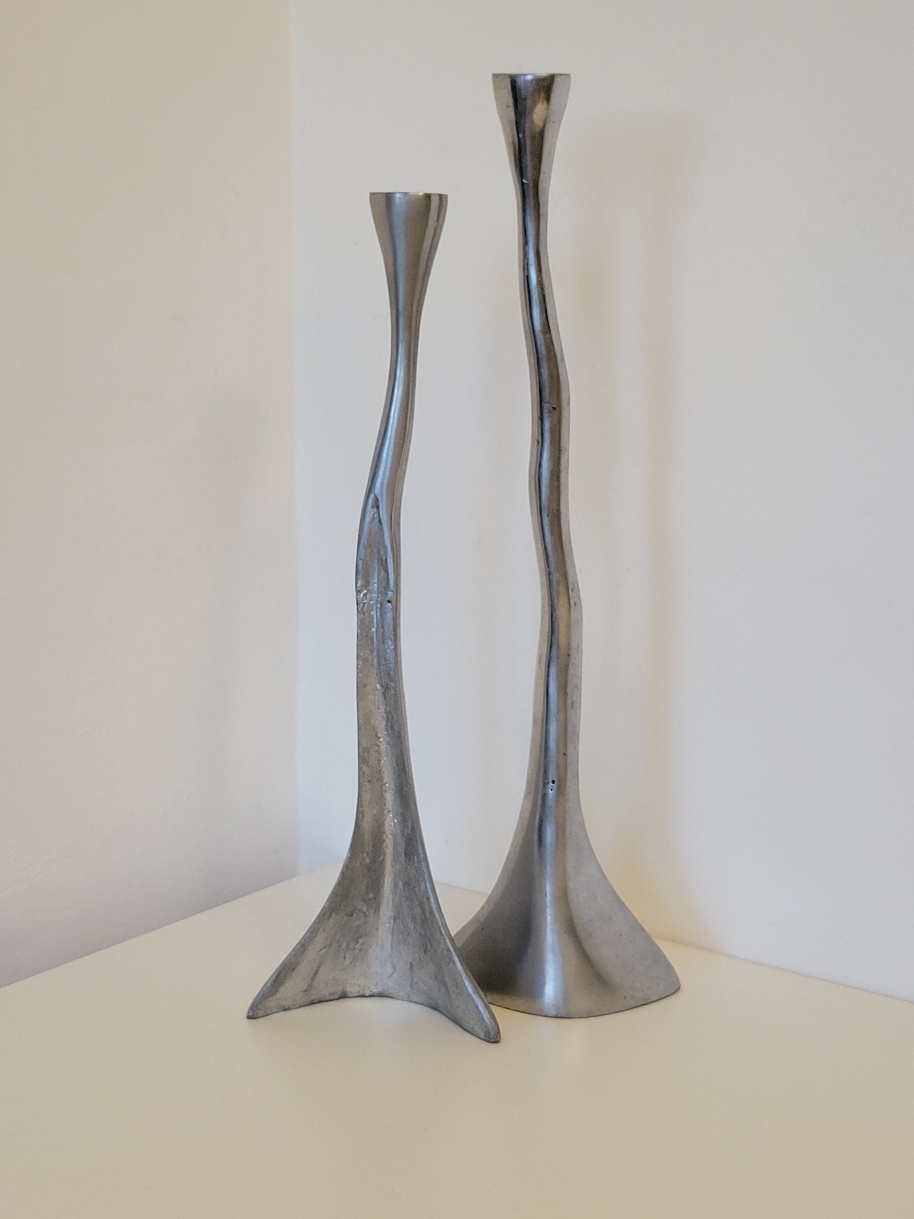 Pair of brutalist metal candlesticks in organic shape sleek design