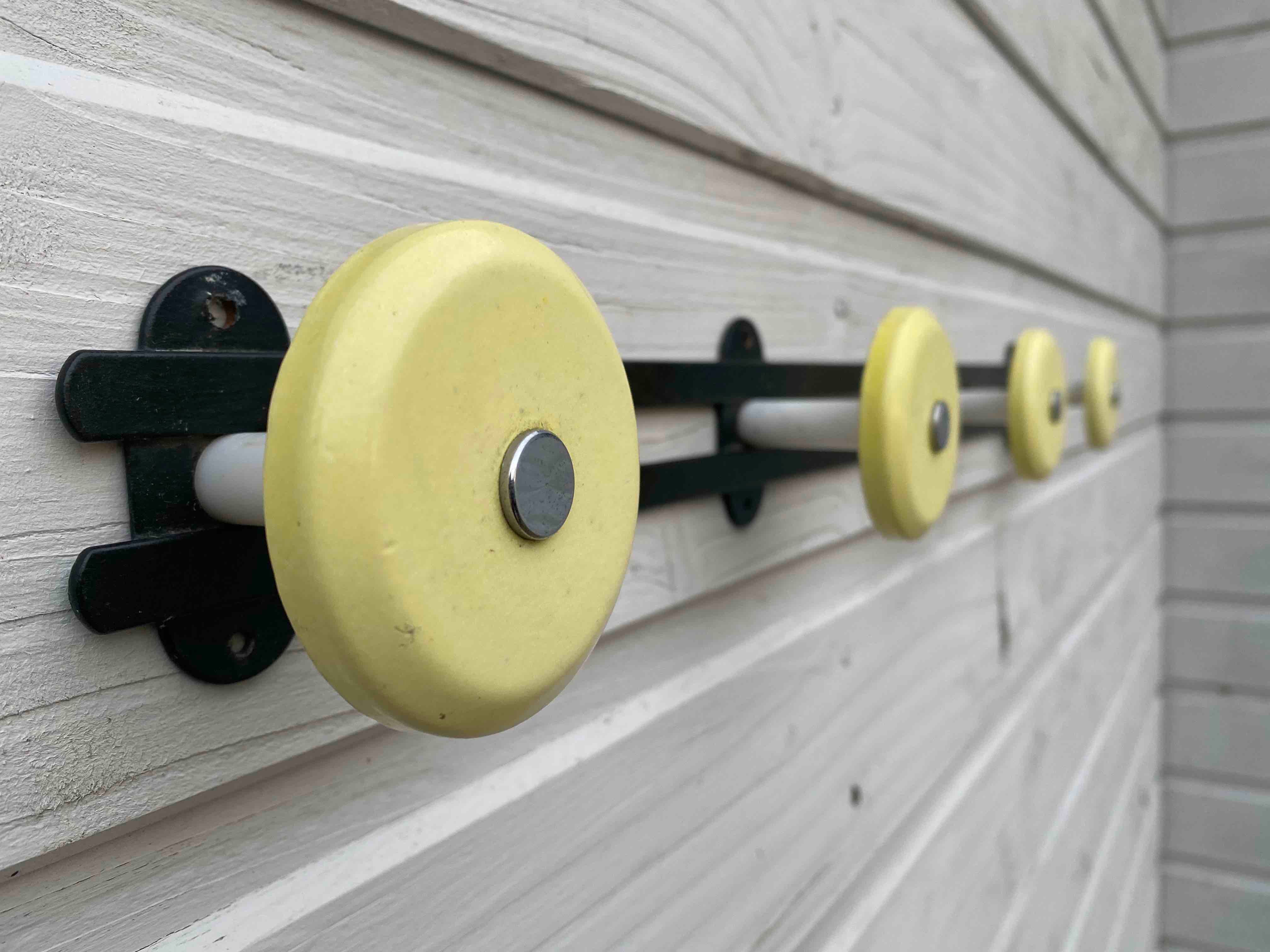Yellow metal coat door