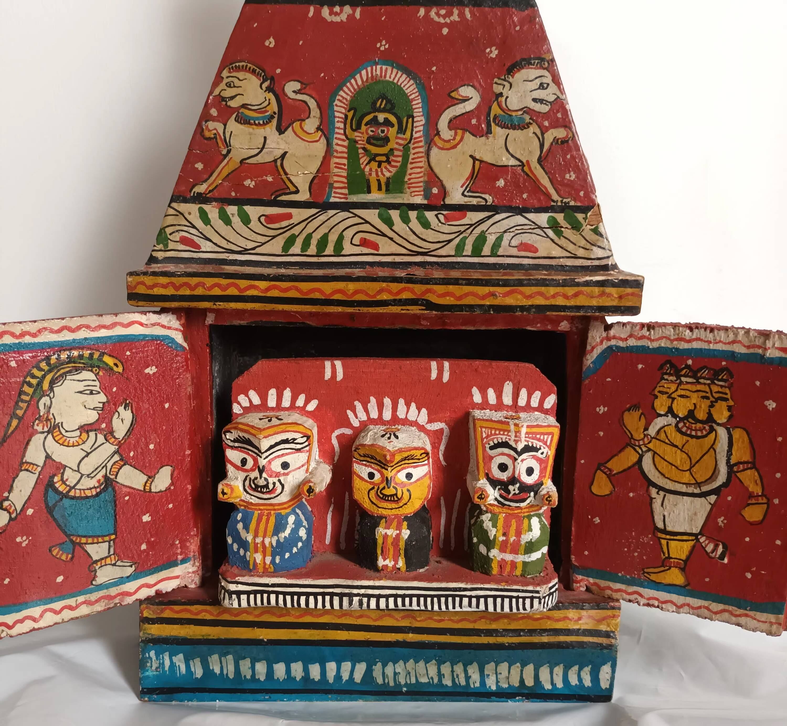 Indian temple made of hand-painted wood