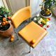 Chair in chromed metal and ochre skaï 1970s