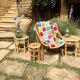Set of three vintage rattan side tables.