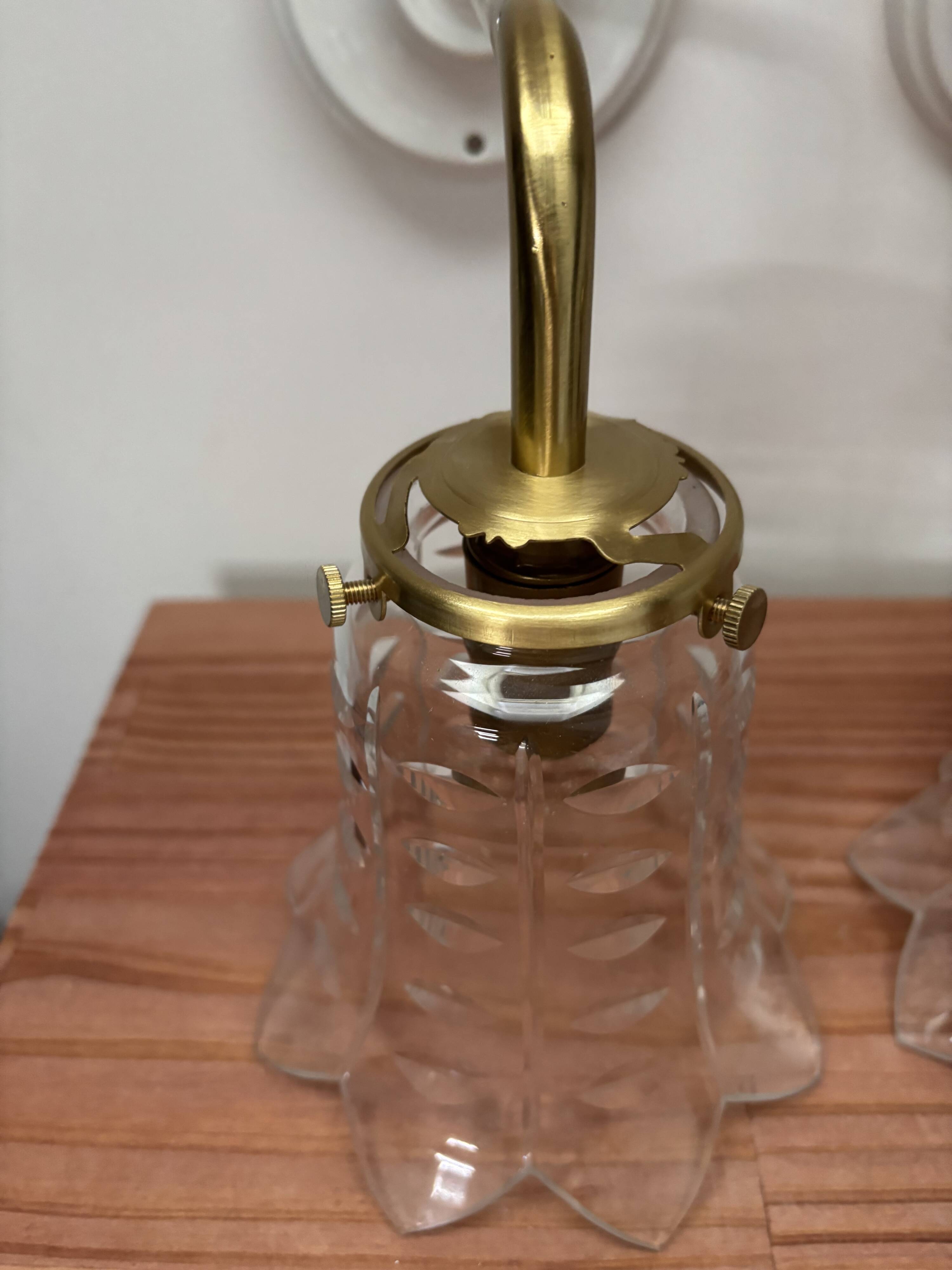 Pair of ceramic and glass wall sconces