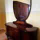 Coiffeuse art deco avec miroir biseauté de forme ovale