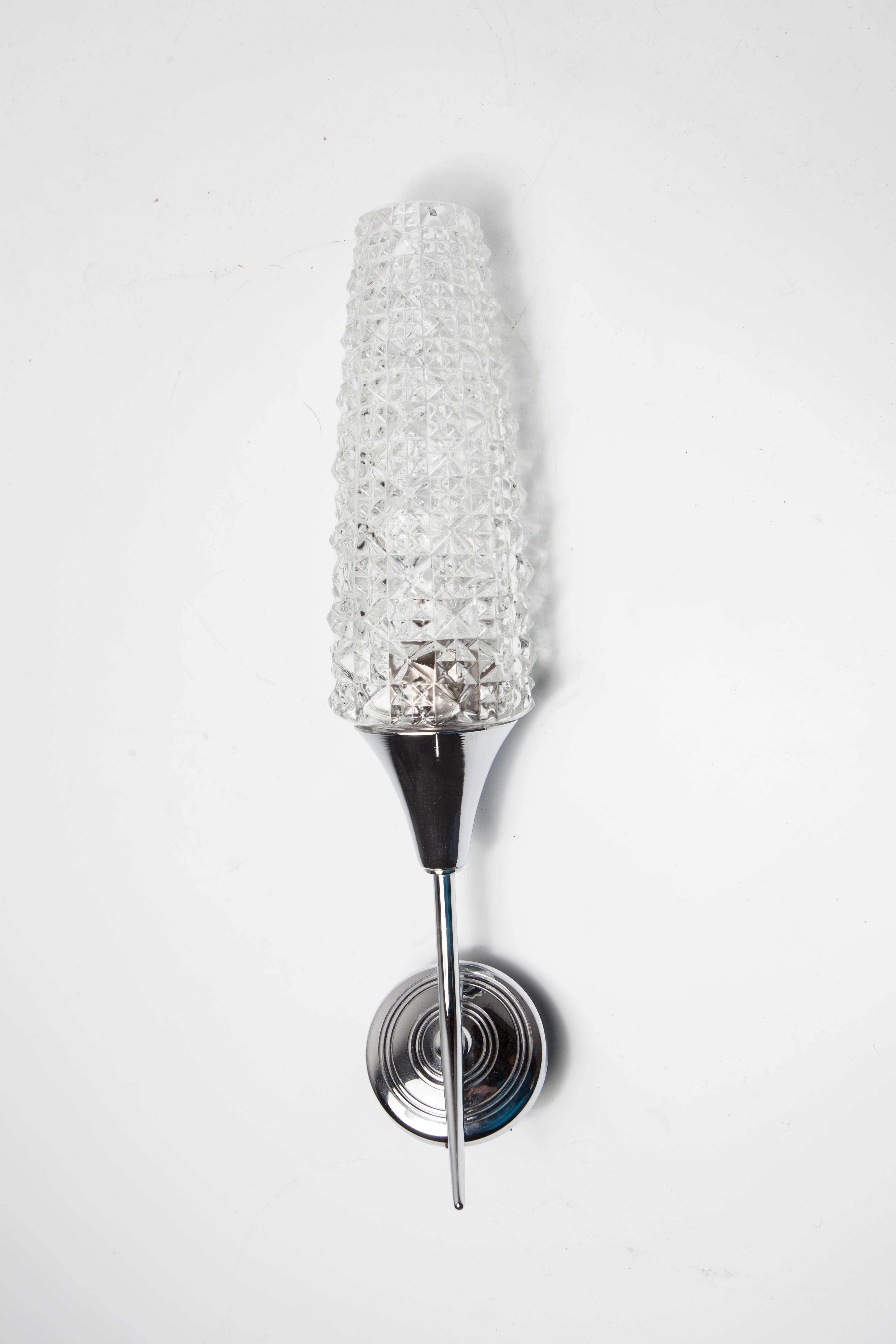 Torch wall lampof the 60s in silver and glass