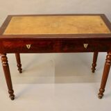 Bureau plat en acajou xixème dessus cuir