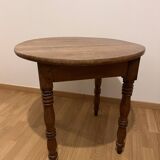 Small round cherry table, turned legs