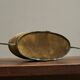 Neoclassical cache-pot in patinated brass, 19th century.