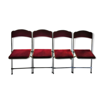Suite de 4 chaises pliantes Opéra velours rouge carmin et structure laiton Vintage