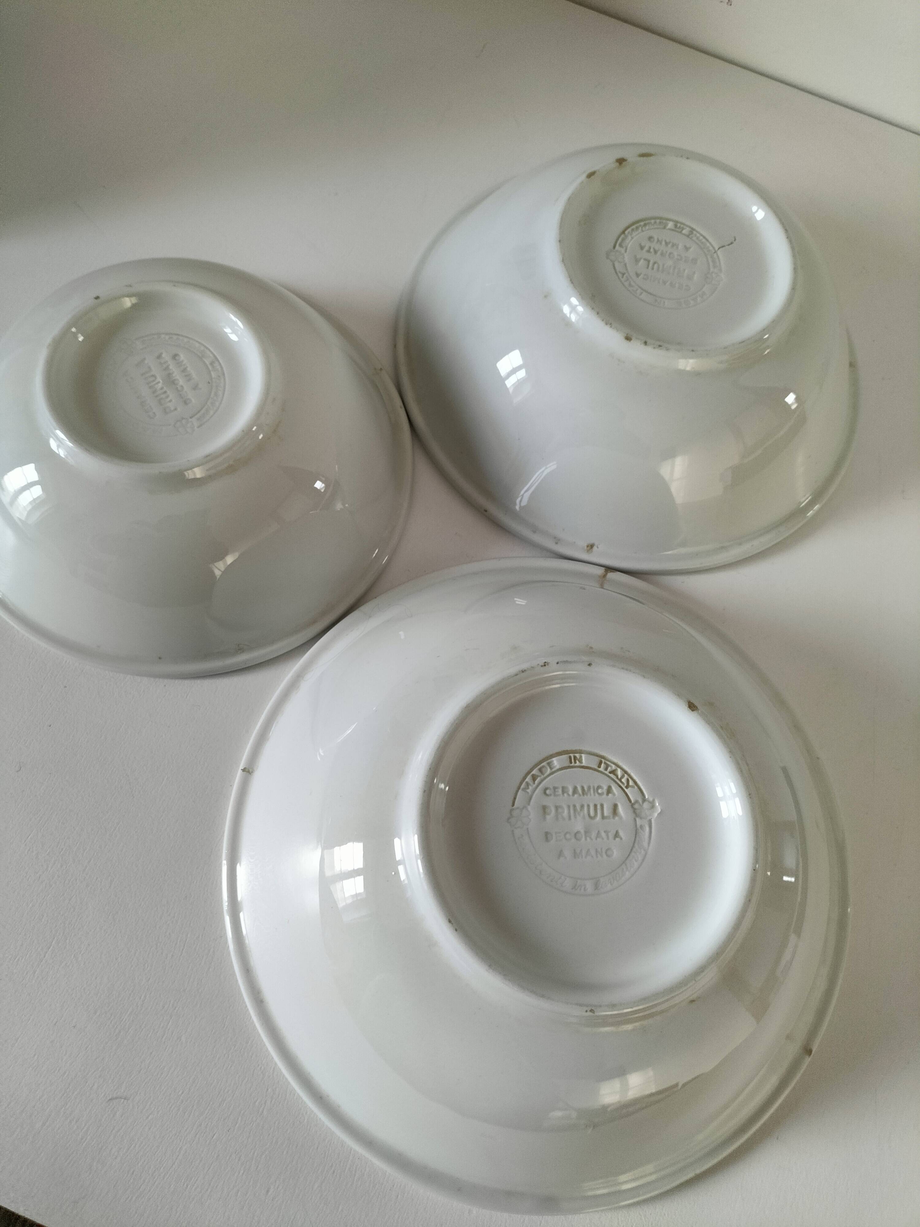 Trio of Italian 1970s deep plates, ochre brown floral decoration