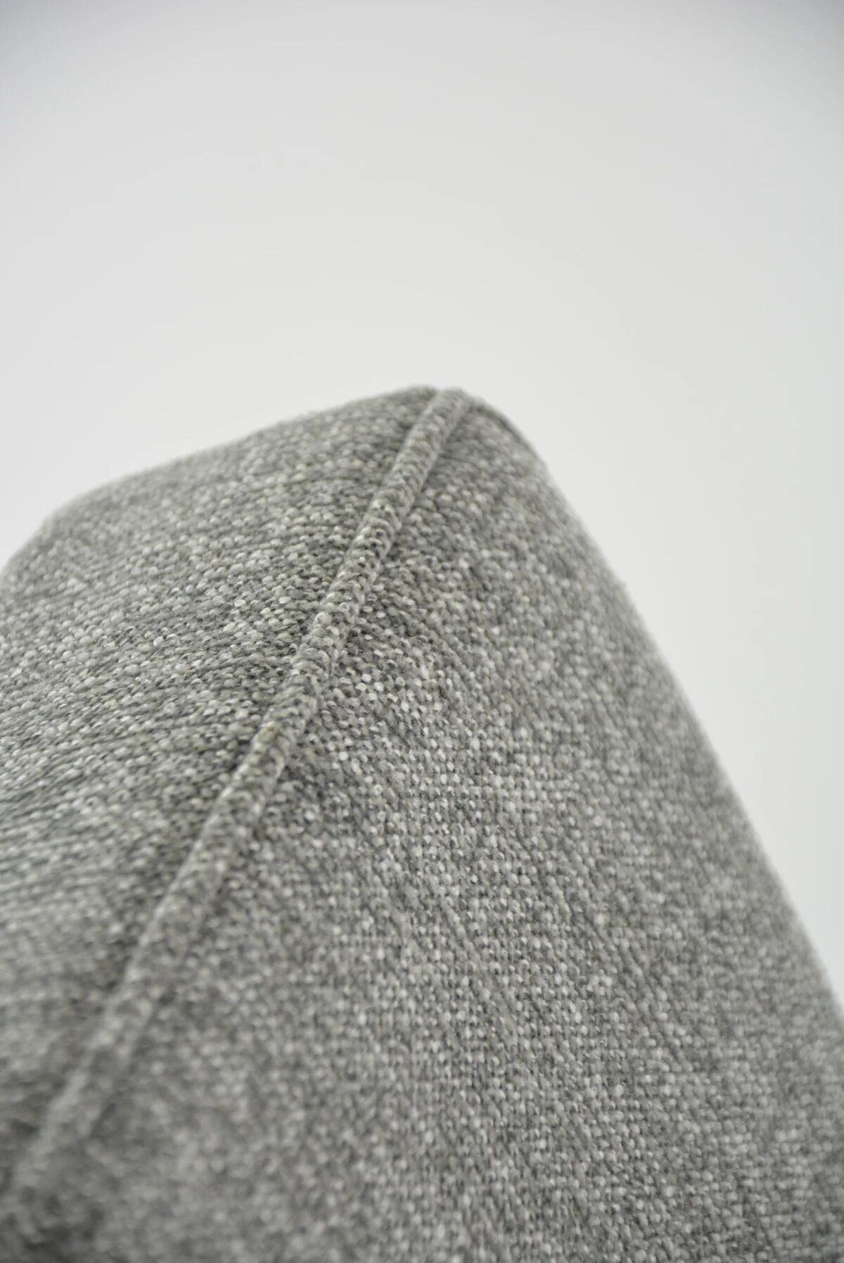 KOMPAS armchairs in grey and white.