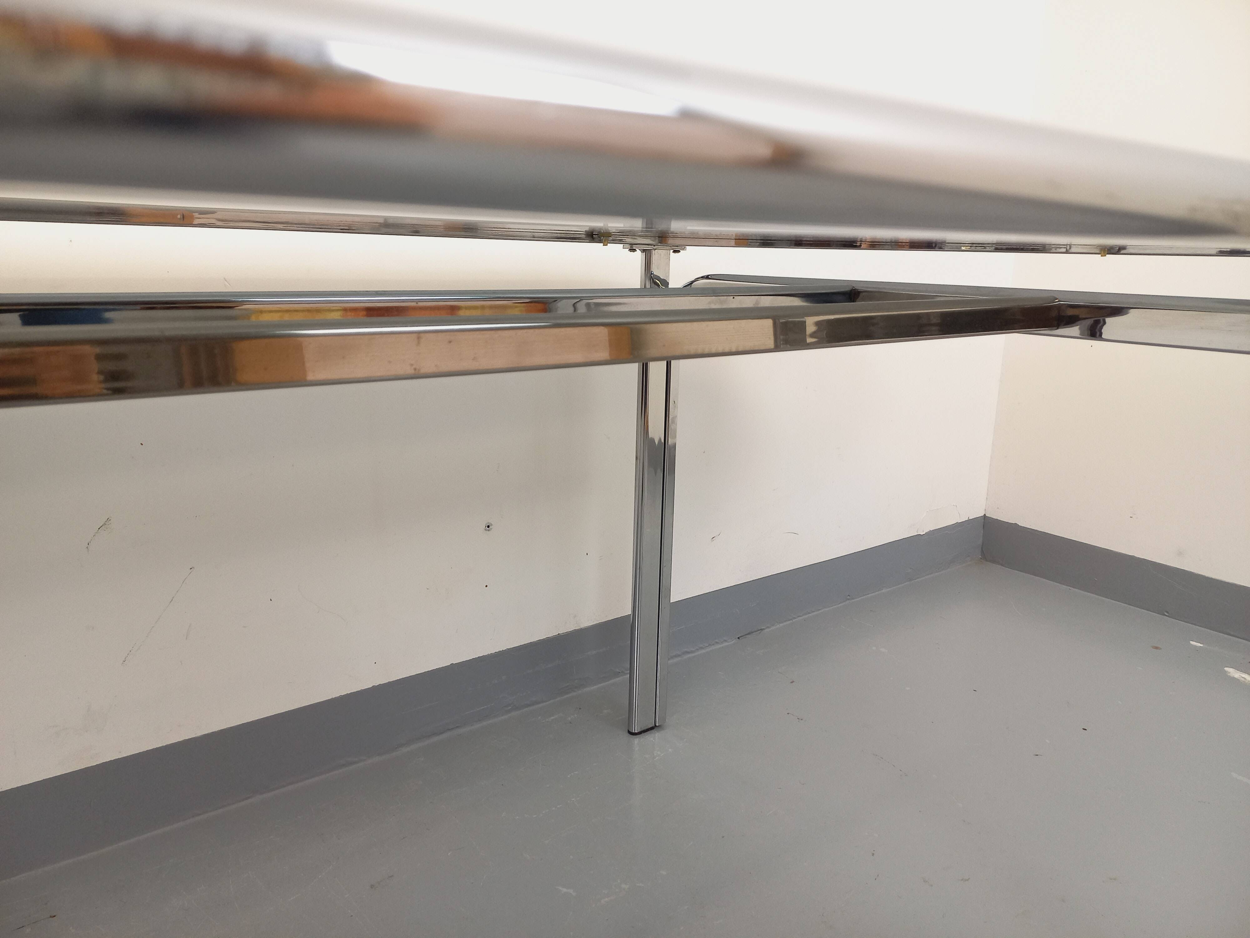 Vintage oval dining table in smoked glass and chrome metal, Space Age style.