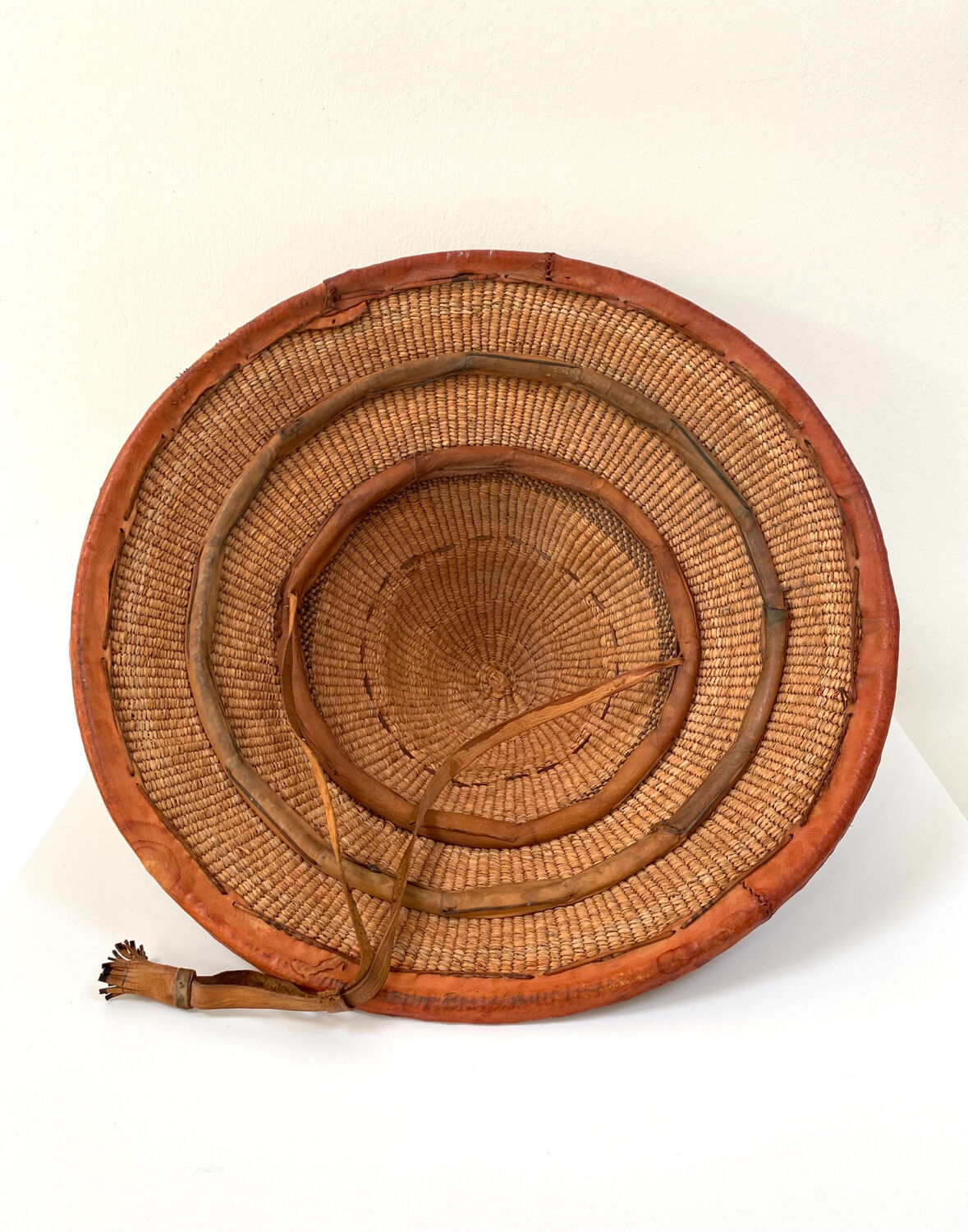 Traditional African Fulani hat in leather and woven straw