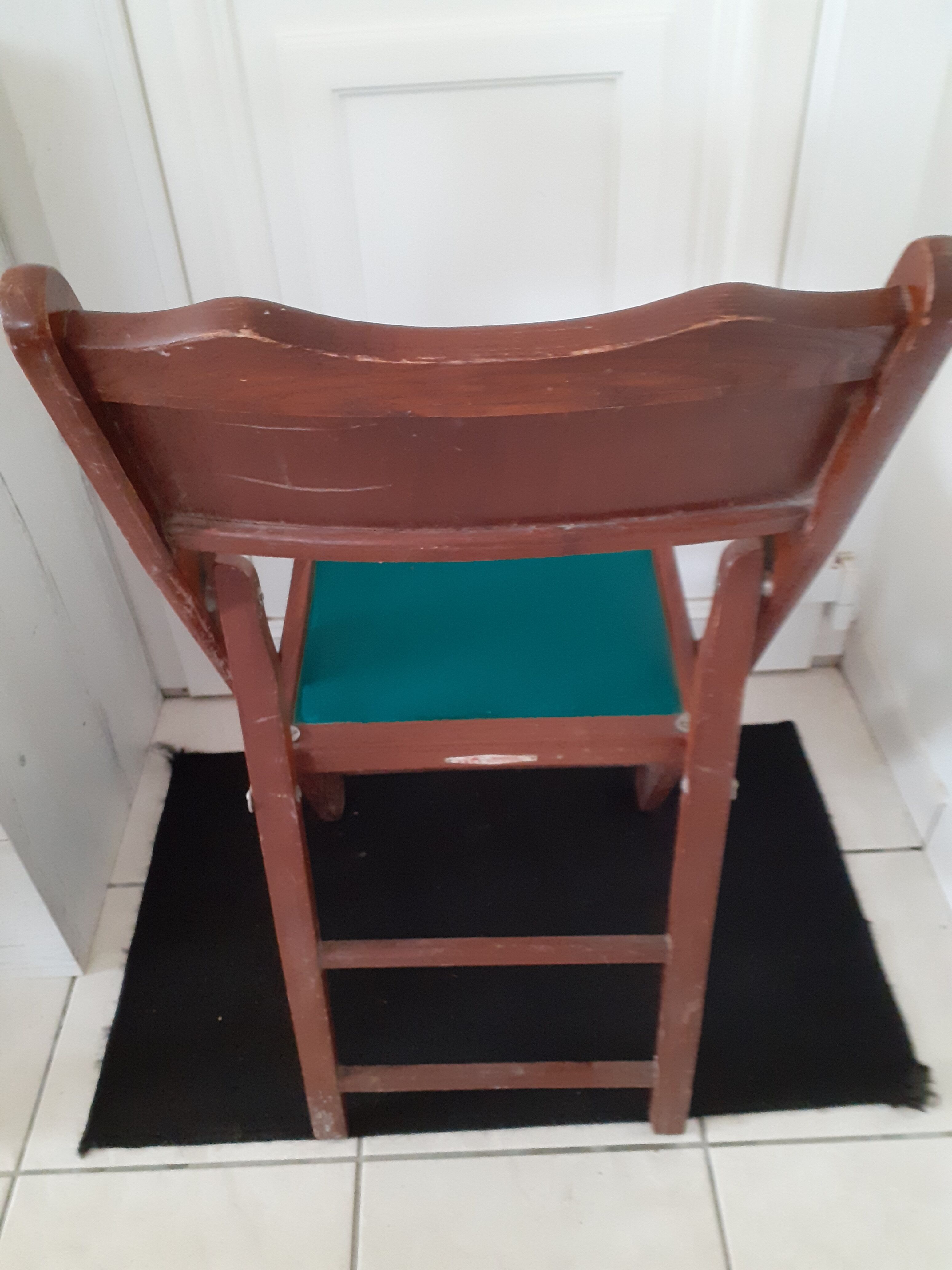 2 folding wooden and skai chairs, 60s